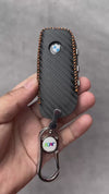 JVCV® Handmade Carbon Fiber Pattern Leather Key Cover Compatible with BMW 2023 New 7 Series 740i 760i X1 X7 XM IX I7 X5 Smart Key – Black Orange